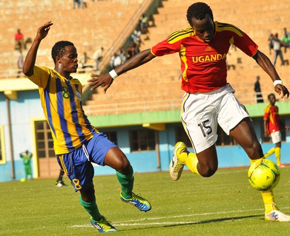 Savio Kabugo (R) battling against a Rwanda opponent during an International build-up in Kigali