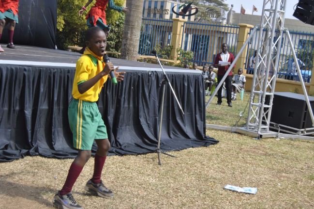 Kampala Solomon performing at the school water& sanitation convention