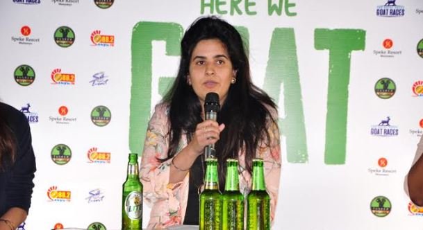 Goat races coordinator Sheena Ruparelia addresses the press.