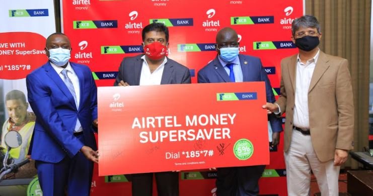 L-R: Mr. Edgar Byamah the KCB Bank Uganda Managing Director, Mr. Manoj Murali the Airtel Uganda Managing Director, Mr. Mackay Aomu the Bank of Uganda Director National Payments and Settlements and Mr. Amit Kapur the Airtel Uganda Chief Commercial Officer during the official launch of the partnership at Kampala Serena Hotel.