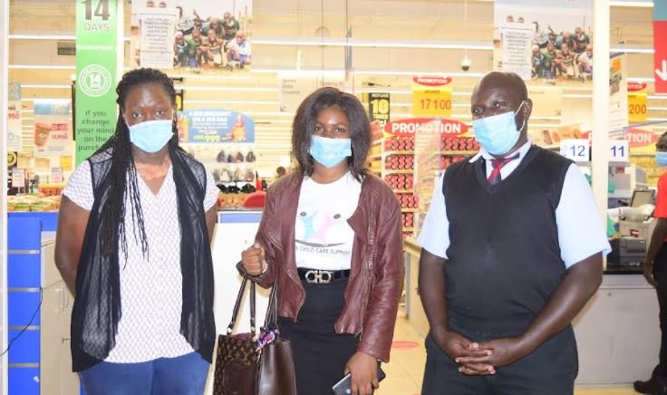 L-R: Gonzaga Kajja; Deputy Manager, Carrefour Naalya at Metroplex Mall with Sylivia Namagembe, Headteacher Kireka Home for the Children with Special Needs and her deputy; Gertrude Lyaka at the launch of the “Round Up you Bill” campaign.