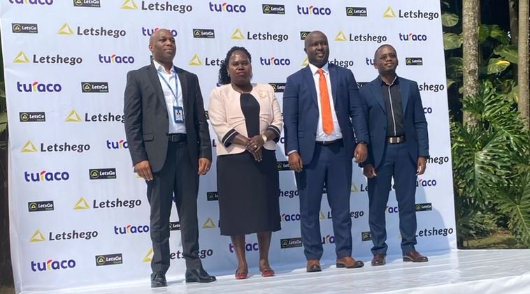 L-R: Giles Aijukwe (CEO Letshego Uganda), Vanessa Muhwezi (UMRA Manager Compliance), Hamza Mutebi (GM Turaco Insurance) and Kevin Katete from IRA pose for a photo after Letshego unveiled its latest LetsGo Insure solution.