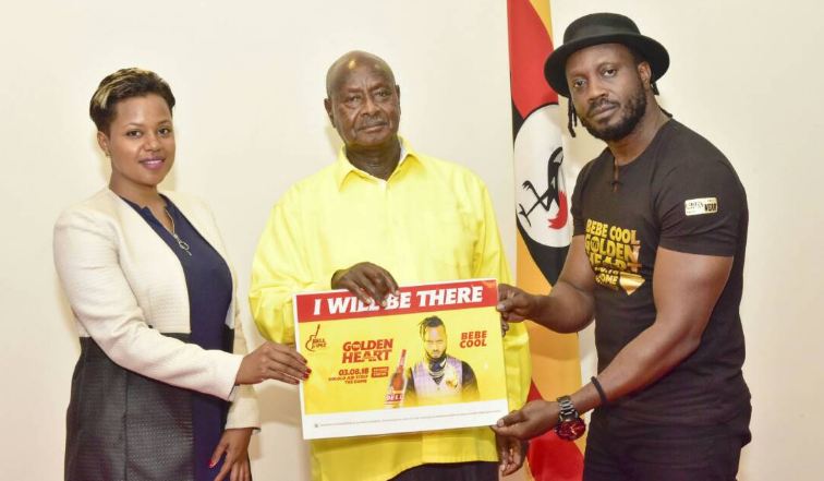 Bebe Cool and his wife Zuena pose with President Museveni