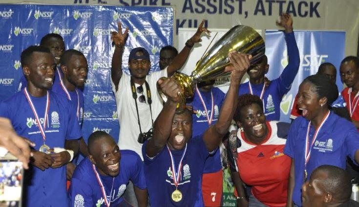 Daudi Okello shares a moment of victory with his KAVC team.