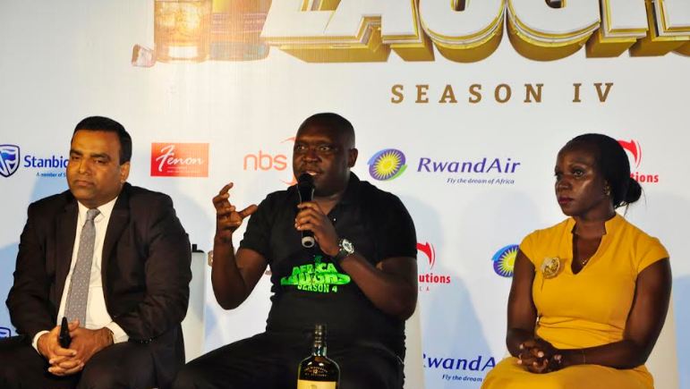 L-R: Speke Apartment's Assistant General Manager Sajeev Kulangarath,comedian Patrick Salvado Idringi, and UBL's Whisky Portfolio Manager Annette Nakiyaga,at the press conference to announce the Africa Laughs show.