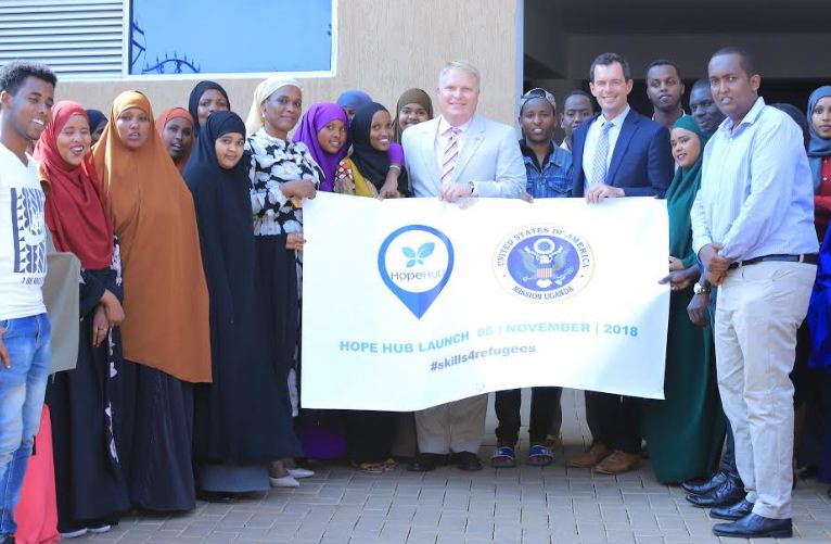 A team from the US Embassy poses for a group photo with some of the students at Hope Hub during the launch ceremony on Wednesday.