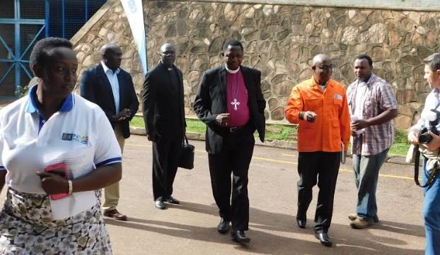 His Grace Stanley Ntagali, flanked NMS General Manager/CEO, Moses Kamabare, arriving for the prayer breakfast on Wednesday morning.