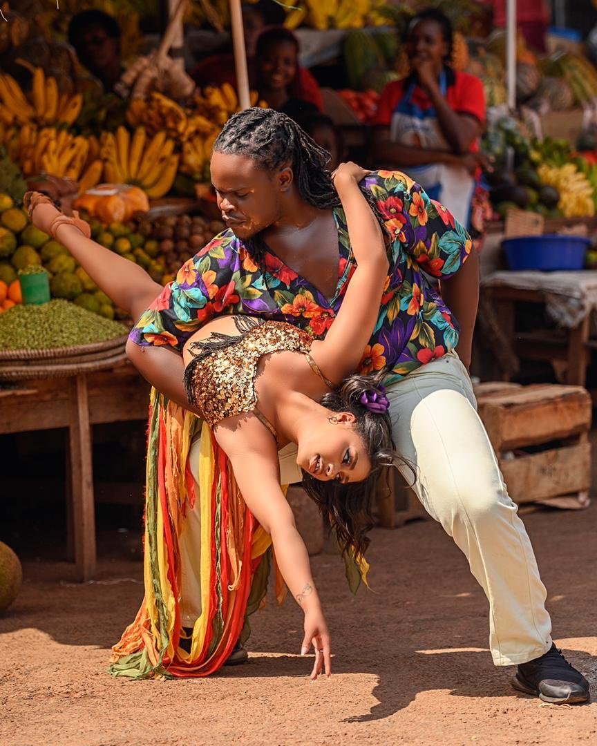 Love is in the air – Latin Dance duo, Valentino and Donlynn dance their way through the colourful markets of Uganda